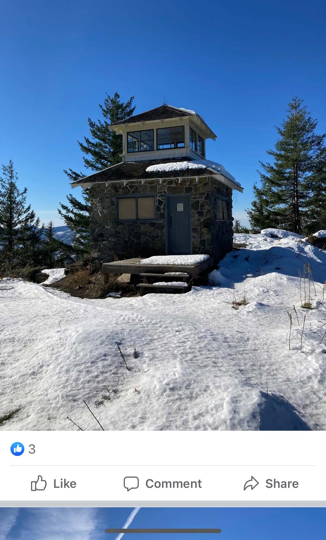Social media screenshot with a fire lookout, made of snow, blanketed in snow