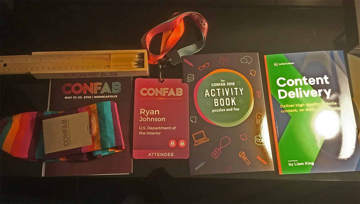 Socks, notebooks, and colored pencils provided by the confab conference team